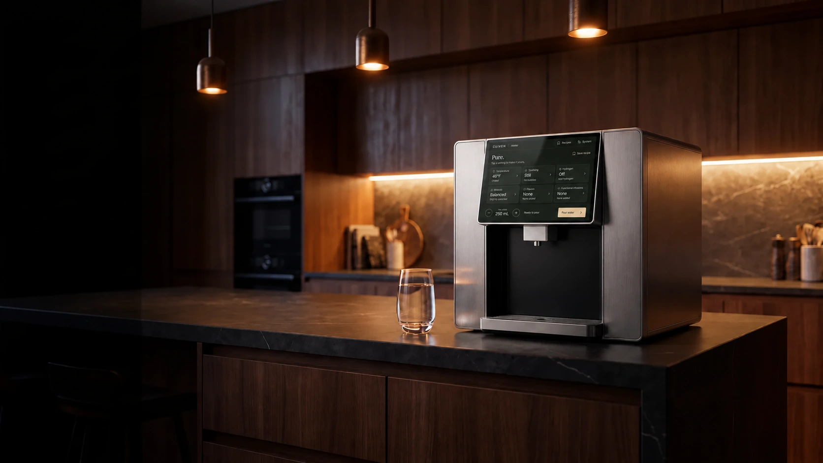 Atelier Countertop with an angled display and brushed metal trim in a warmly lit kitchen
