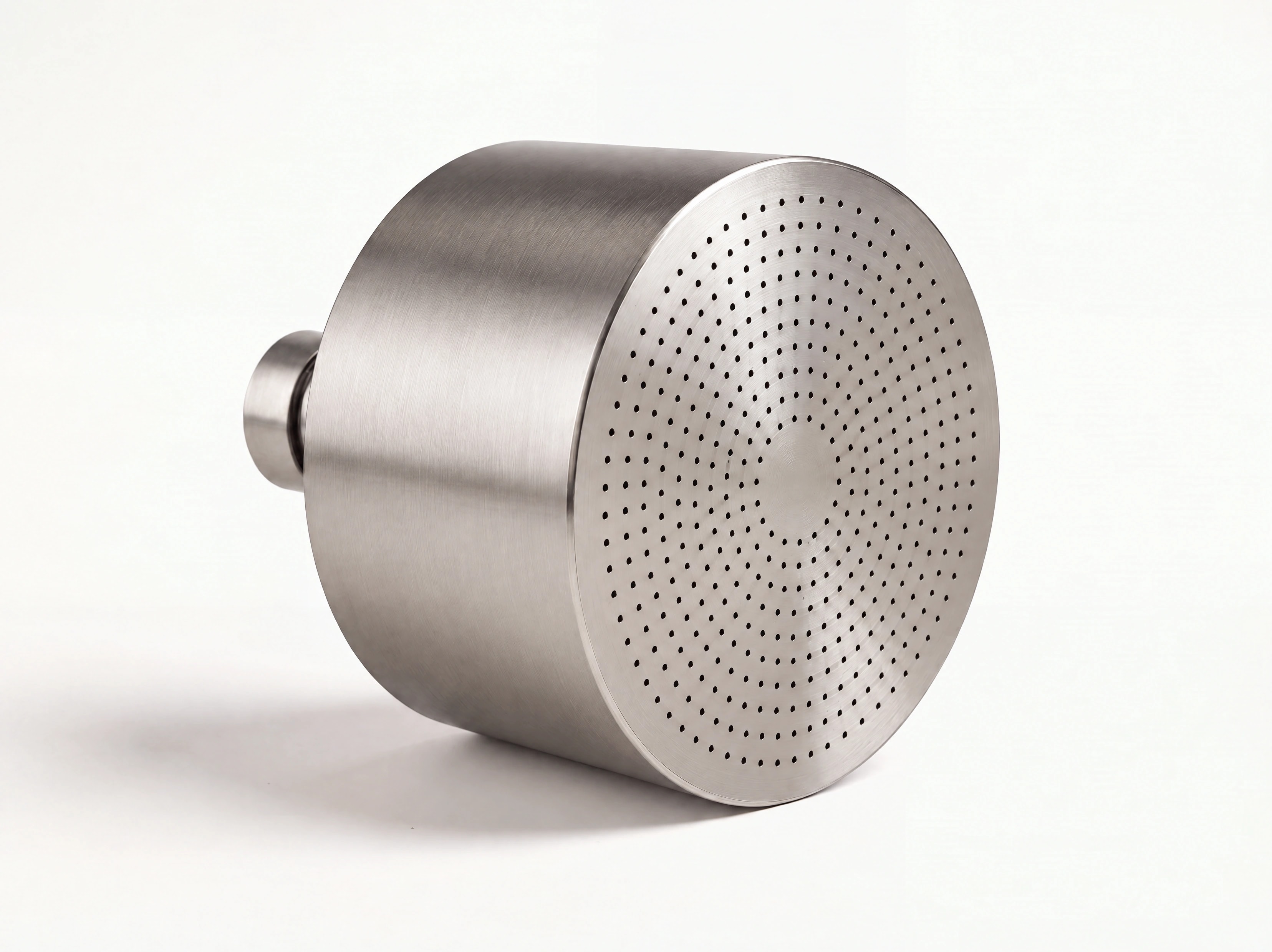 Monolith in Stainless, showing its housing and perforated rainfall face